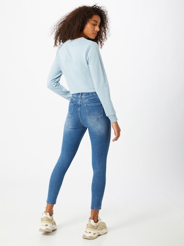 Coupe slim Jean Hailys en bleu