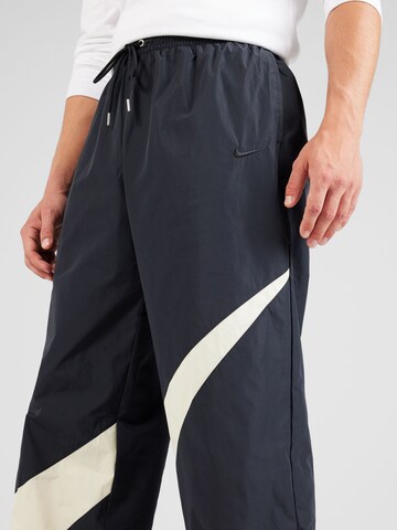 Nike Sportswear Loose fit Trousers in Black