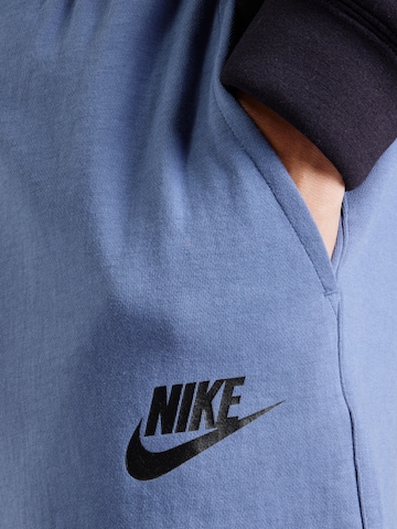 Nike Sportswear Loosefit Broek 'FLC' in Blauw