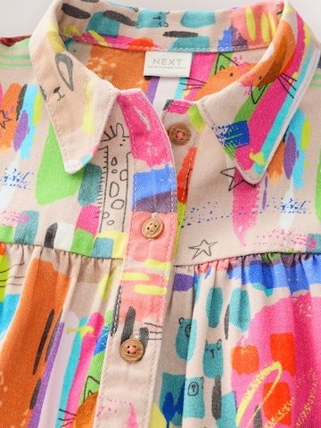 Rochie de la Next pe bej