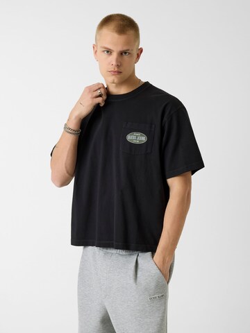 GUESS T-Shirt in Schwarz