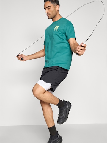 UNDER ARMOURTehnička sportska majica - zelena boja