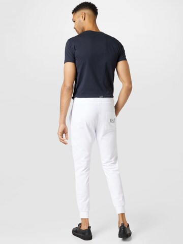 Tapered Pantaloni di EA7 Emporio Armani in bianco