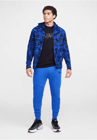 NIKE Tapered Broek in Blauw