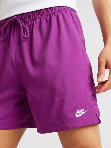 purpurinė Nike Sportswear Laisvas Kelnės 'Club'