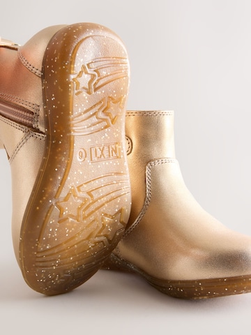 Next Stiefel in Gold