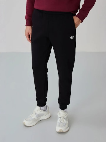 Tommy Life Joggingpak in Rood