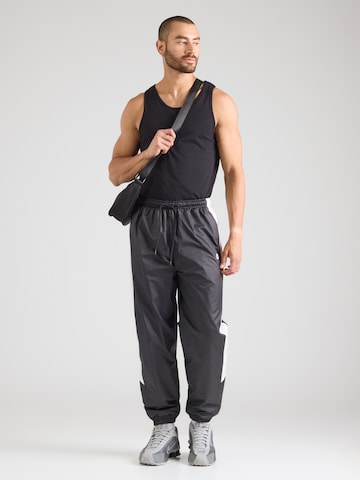 Nike Sportswear Tapered Pants in Black