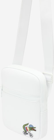 LACOSTE Чанта за през рамо тип преметка в бяло: отпред