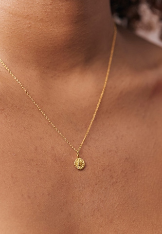 Stilnest Pendant in Gold: front