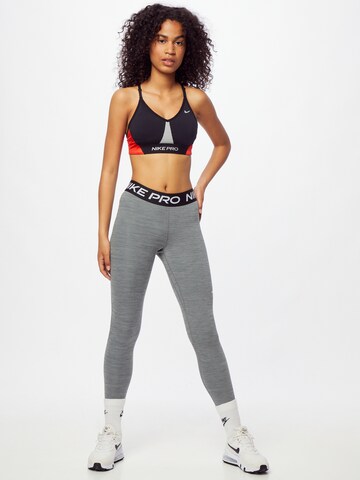 NIKE Skinny Športové nohavice - Sivá