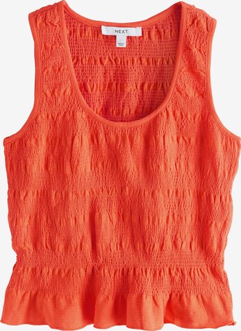 Top di Next in arancione: frontale