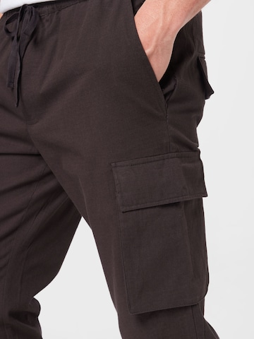 ABOUT YOU Tapered Cargo trousers 'Mailo' in Black