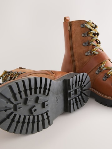 ruda Next Suvarstomieji kulkšnis dengiantys batai 'Forever Comfort'