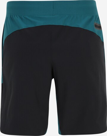 UNDER ARMOUR Regular Sportshorts 'Peak Woven Hybrid' in Blau