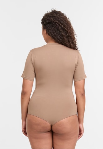 Body Lykkeland Atelier en marron