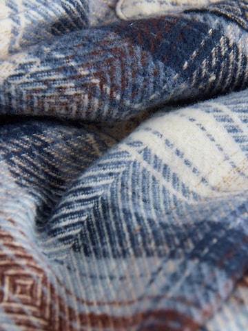 Next Tussenjas in Blauw