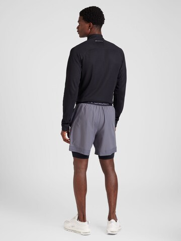UNDER ARMOUR Regular Sports trousers 'Vanish' in Grey
