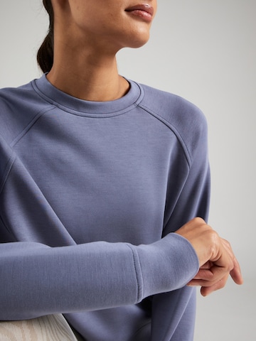 Athlecia Sportief sweatshirt 'Jacey' in Blauw