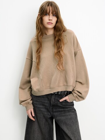 Bluză de molton de la Pull&Bear pe roz: față