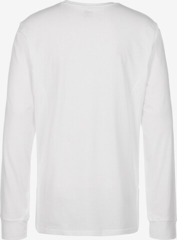 T-Shirt fonctionnel PUMA en blanc