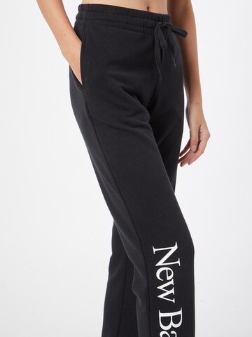 new balance Slim fit Pants in Black