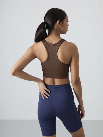 Tommy Life - Top desportivo em castanho