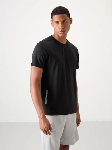T-Shirt fonctionnel Tommy Life en noir