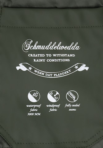 Schmuddelwedda Toiminnallinen takki värissä vihreä