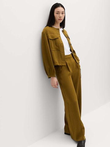Wide leg Pantaloni con piega frontale di Marks & Spencer in verde: frontale