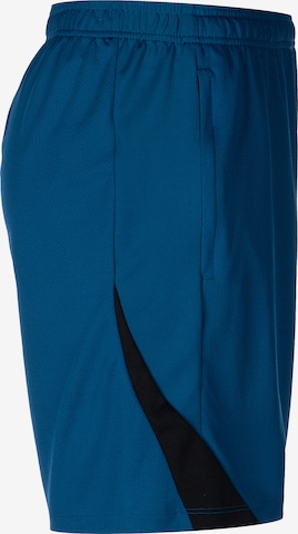 NIKE Loose fit Athletic Pants 'Strike' in Blue