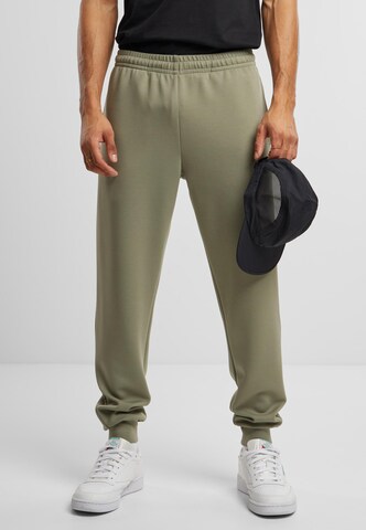 Urban Classics Tapered Trousers in Green: front