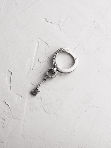 REYTEL Ohrring 'KEY' in Silber: Vorderseite