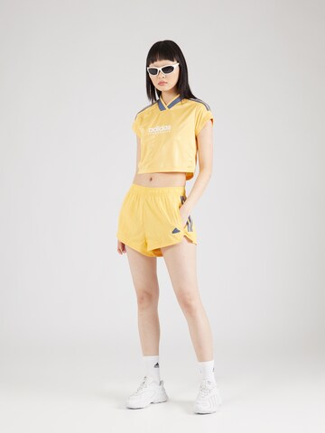 ADIDAS SPORTSWEAR Loosefit Sportovní kalhoty 'Tiro' – žlutá