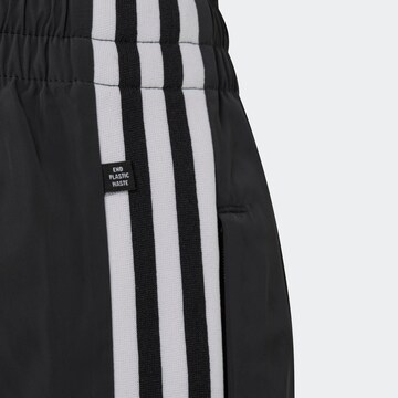 ADIDAS ORIGINALS Loose fit Pants 'Adicolor' in Black