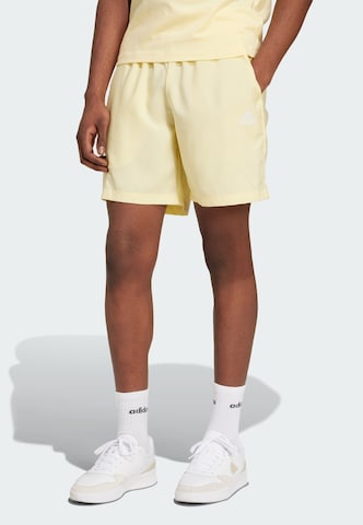 ADIDAS SPORTSWEAR Regular Workout Pants 'Essentials Chelsea' in Yellow: front