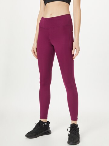 NIKE Skinny Workout Pants in Purple: front