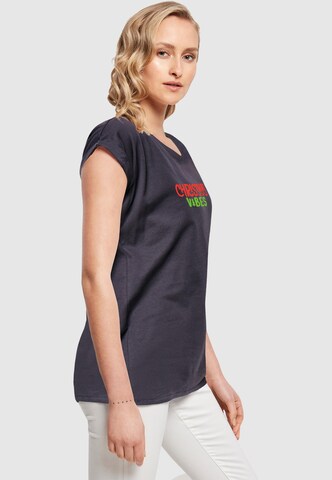 T-shirt 'Christmas Vibes ' Merchcode en bleu