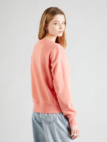 GUESSSweater majica - narančasta boja