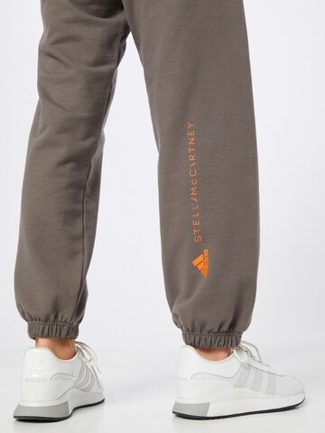 Loosefit Pantaloni sportivi di ADIDAS BY STELLA MCCARTNEY in grigio