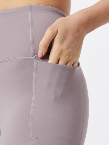 UNDER ARMOUR Skinny Sporthose 'Meridian' in Lila