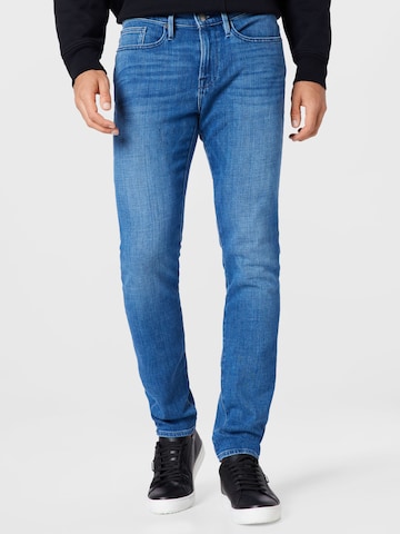 FRAME Skinny Jeans in Blue: front