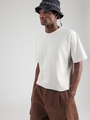 Maglietta 'ESS' di Nike Sportswear in beige: frontale