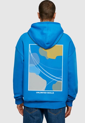 Merchcode Sweatshirt 'Unlimited Skills' in Blauw: voorkant