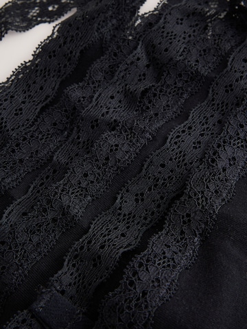 Next - Tanga en negro