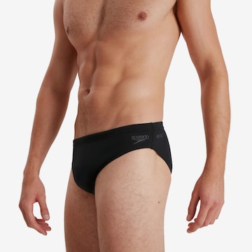 SPEEDO Athletic Swim Trunks in Black: front