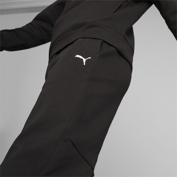 PUMA Regularen Športne hlače 'Rad/Cal' | črna barva
