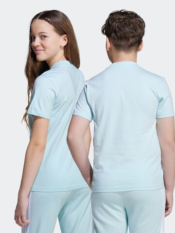 ADIDAS SPORTSWEAR - Camisa funcionais em azul