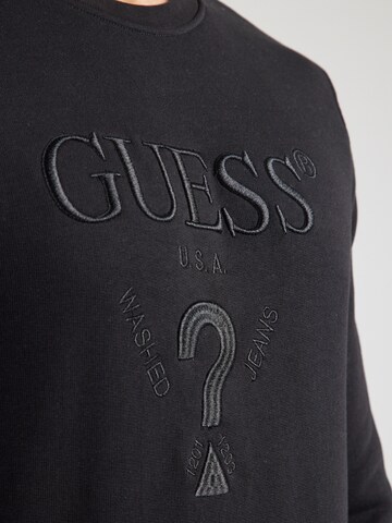 GUESSSweater majica 'BEAU' - crna boja