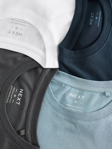Tricou de la Next pe albastru